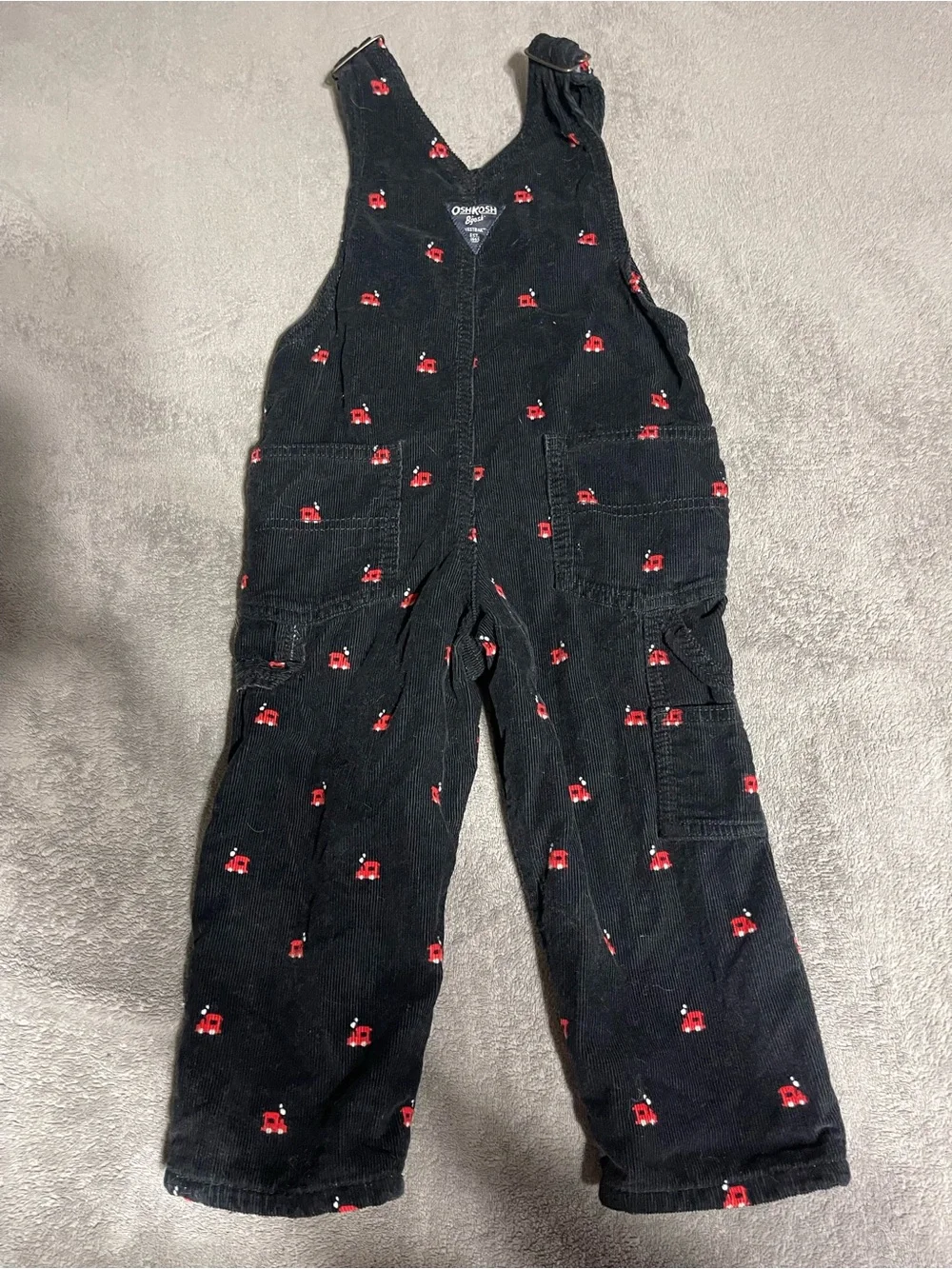 OshKosh B'gosh Black Corduroy Overalls with Small Red train Details